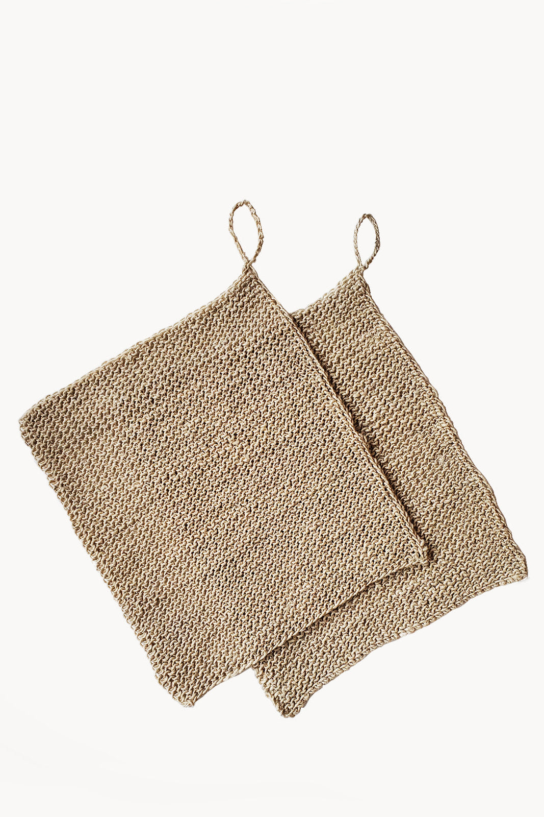 Two beige textured pot holders on a white background