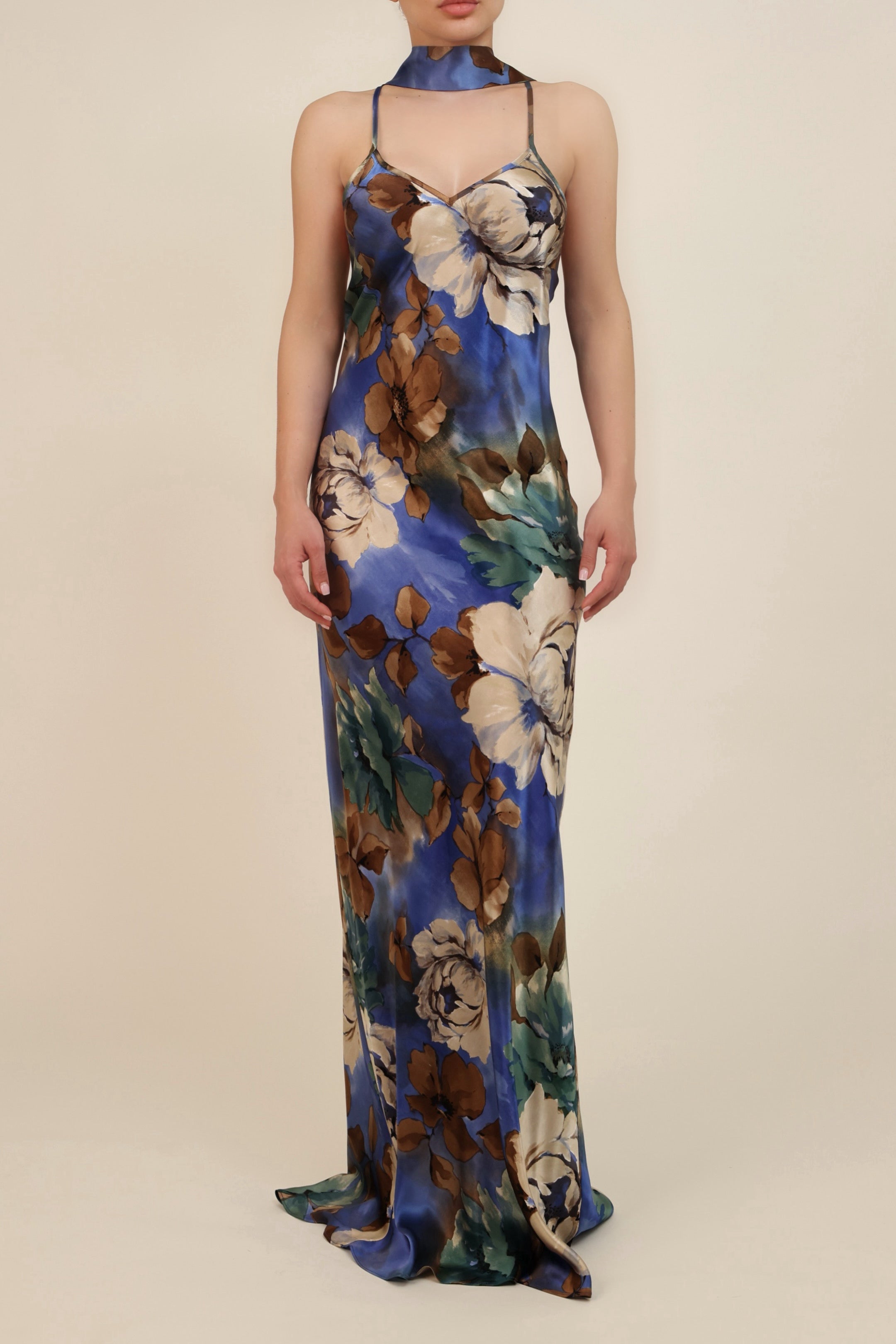 Floral patterned dress on a beige background
