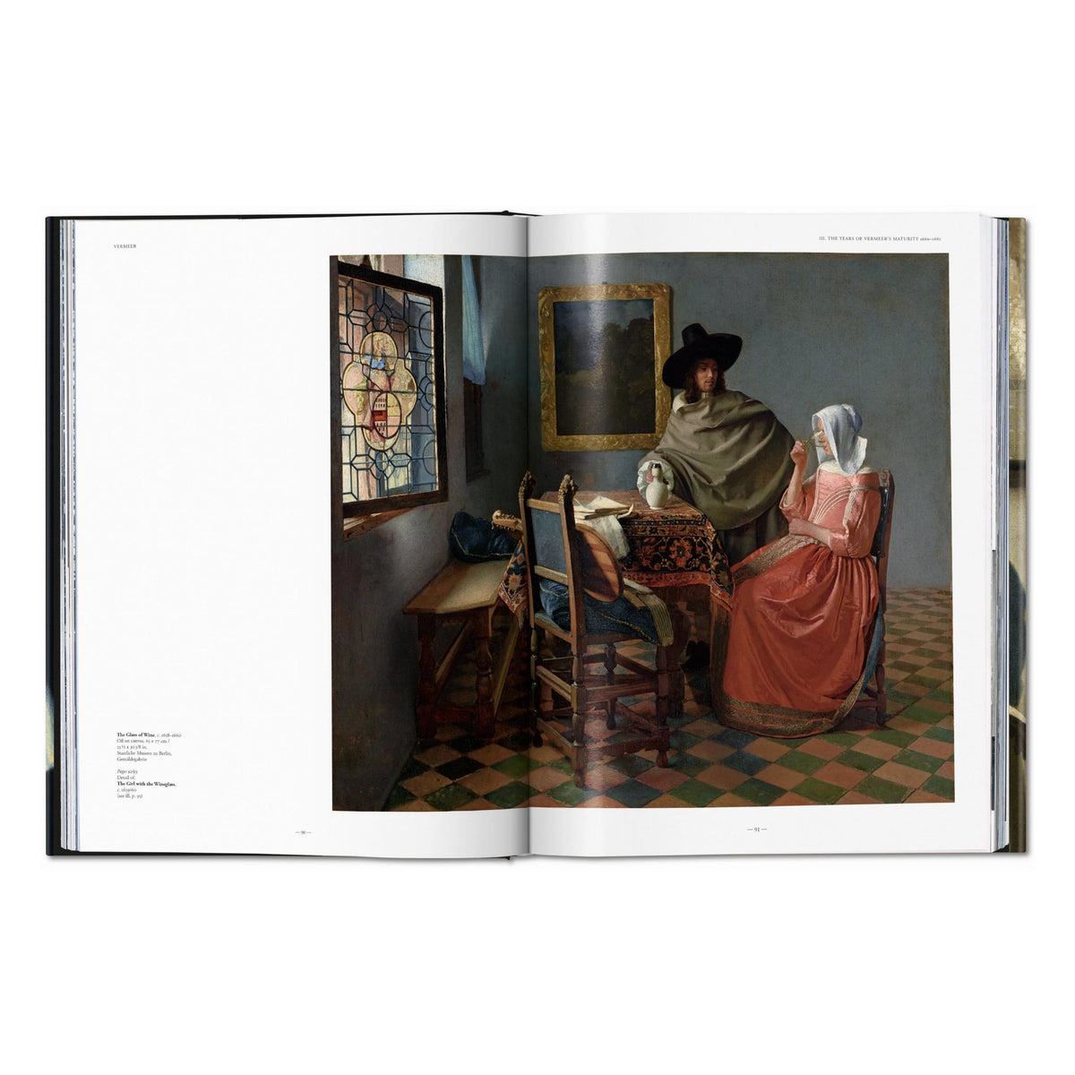 Open book showing a classical painting of two people in a room with a stained glass window.