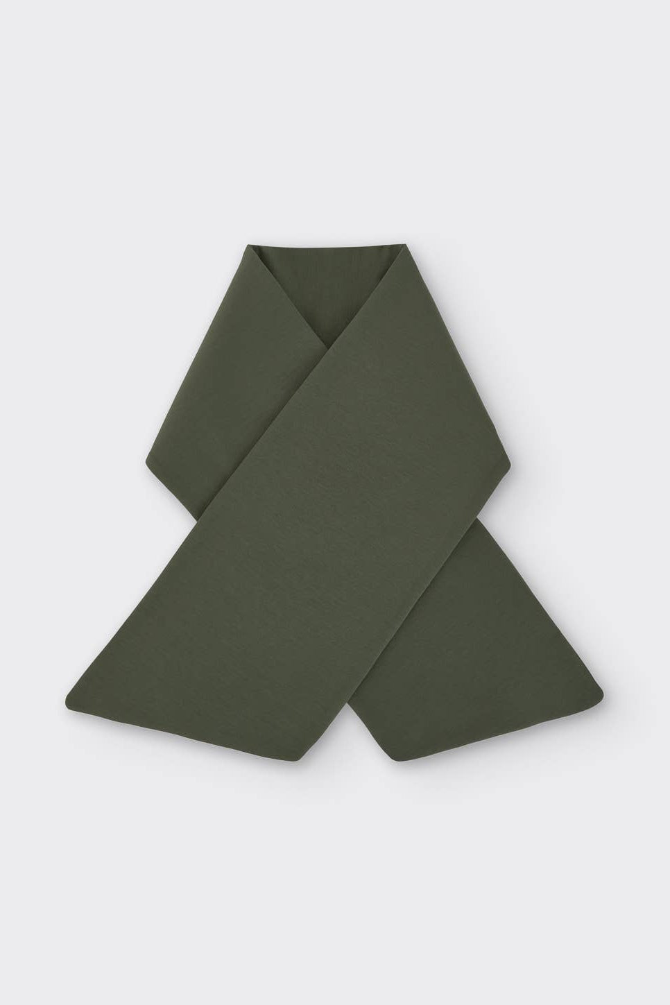 Green scarf on a light gray background