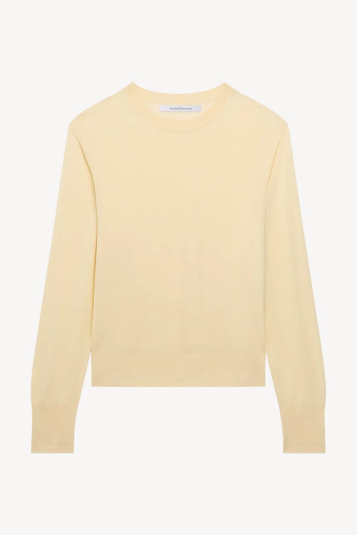 Light yellow sweater on a white background