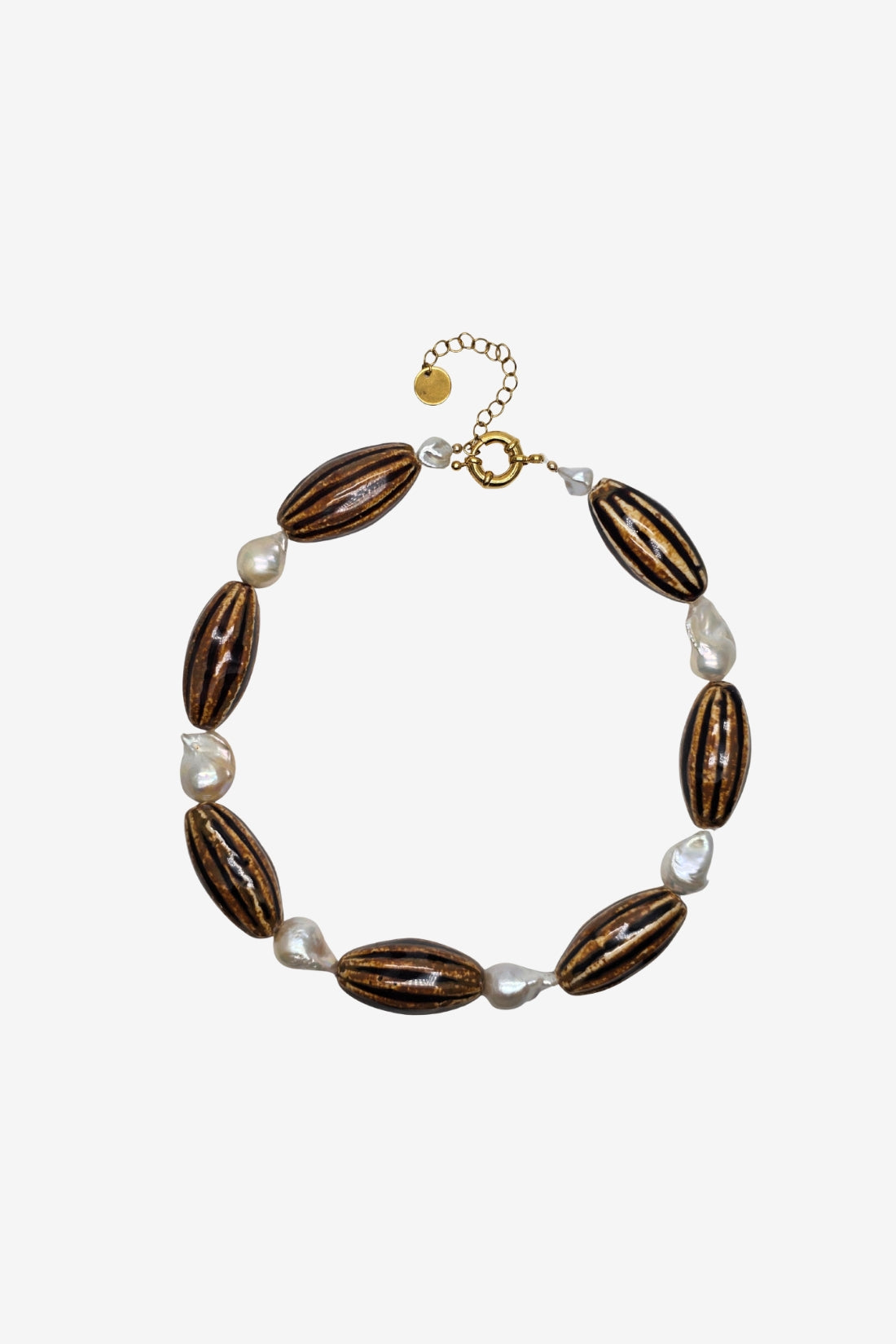 Bracelet with brown wooden beads and white pearls on a white background