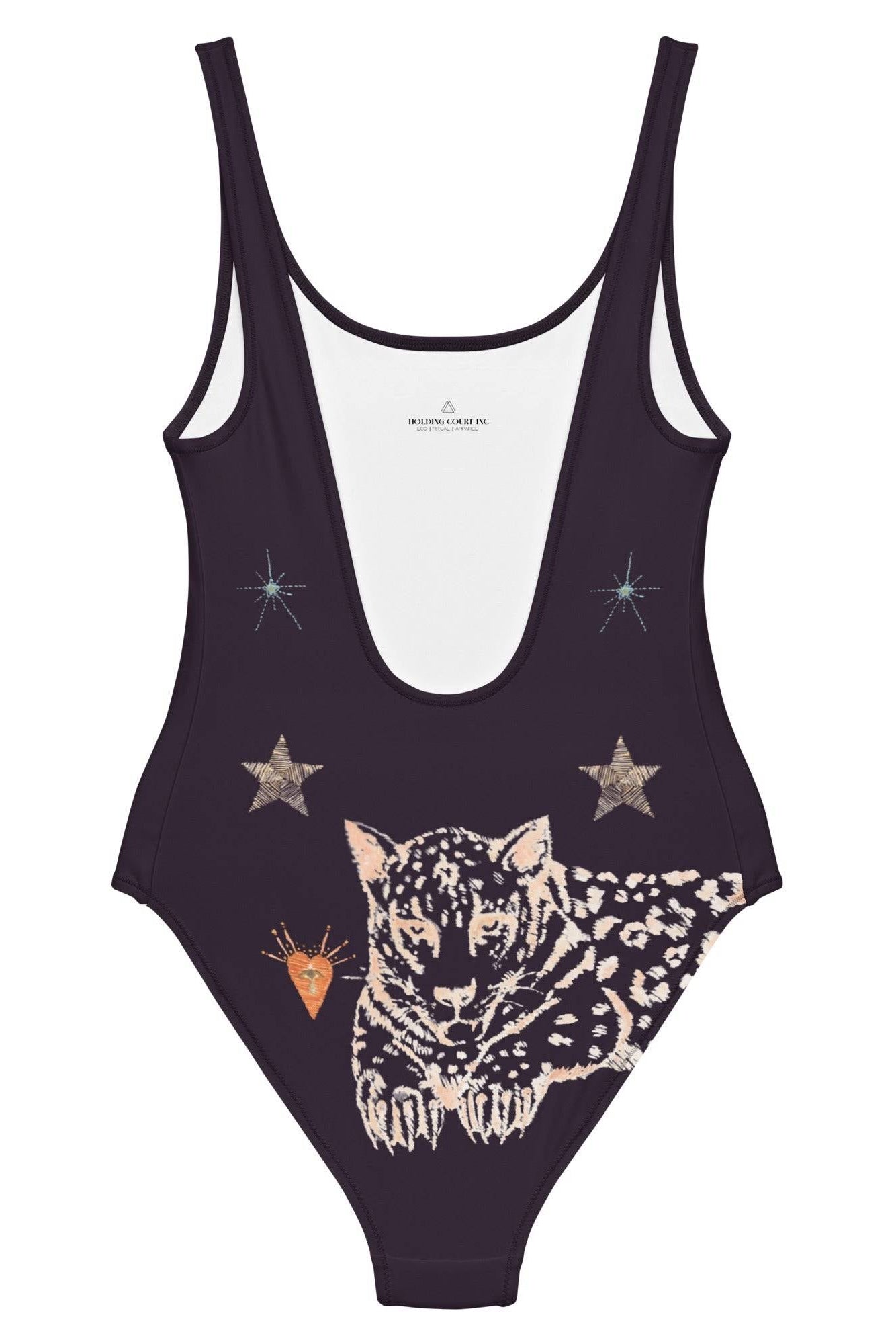One-piece swimsuit with leopard and star design on a white background