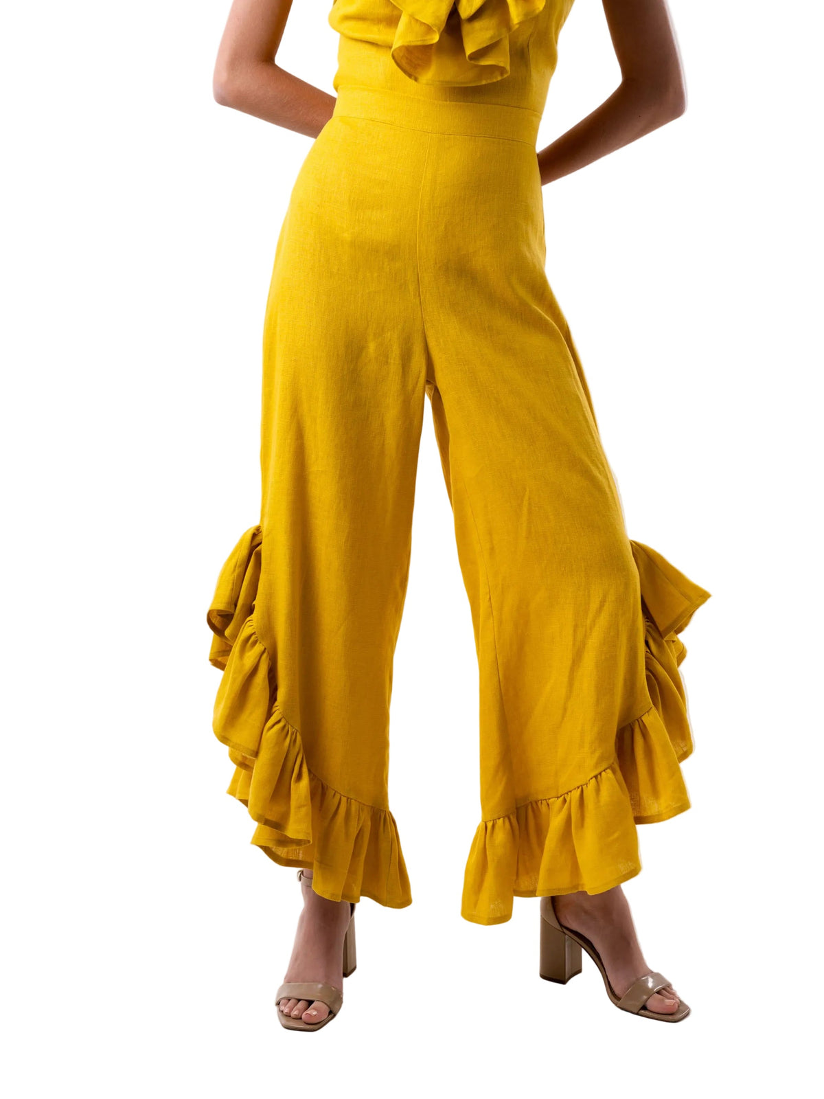 Yellow ruffled jumpsuit on a white background