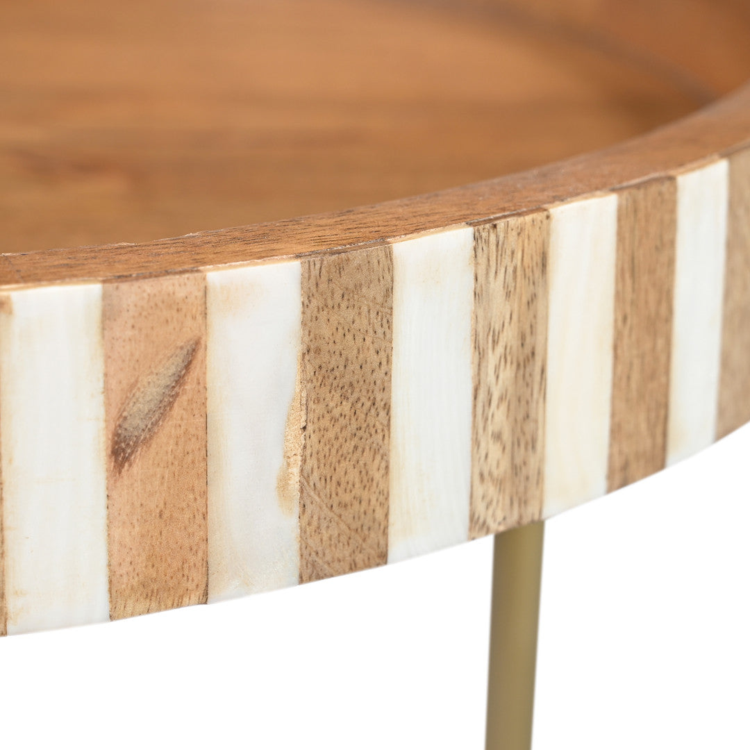 Close-up of a wooden side table with a striped pattern