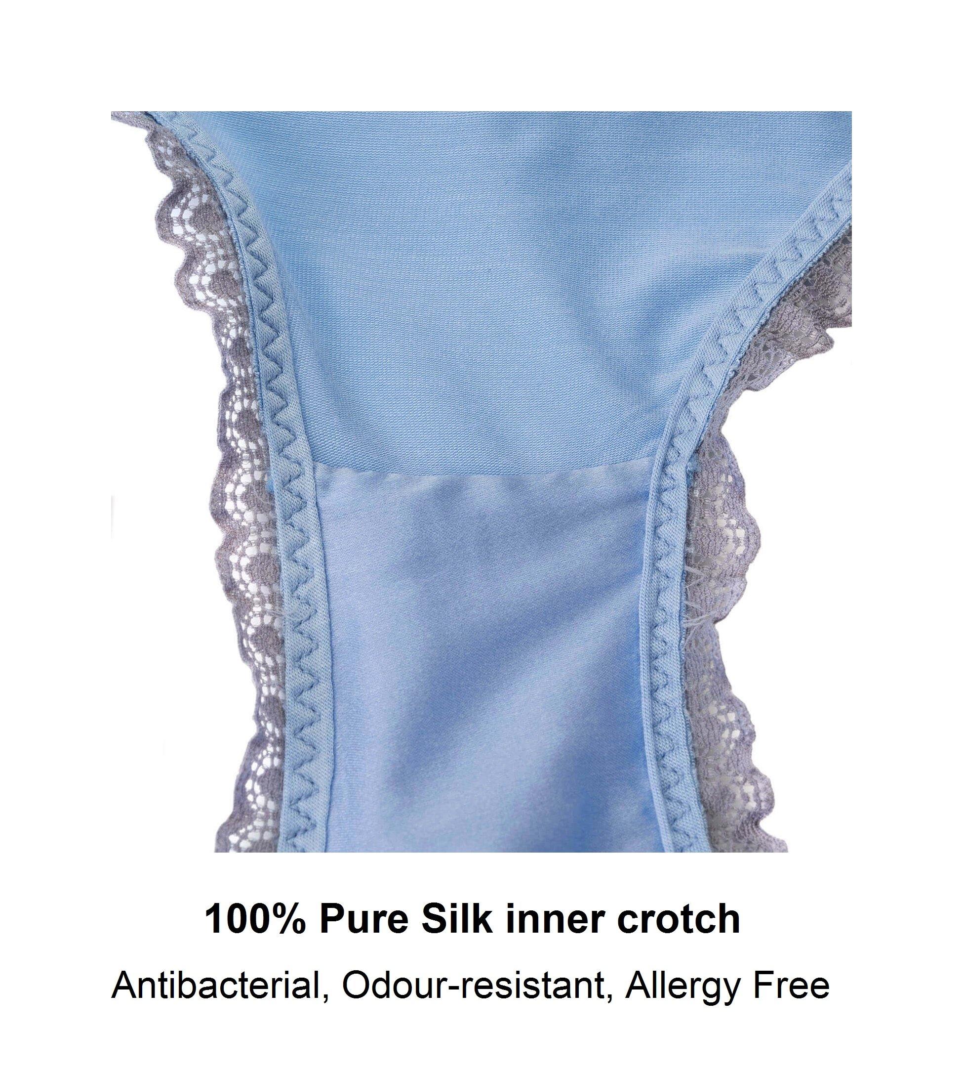 Light blue silk underwear with lace trim on a white background