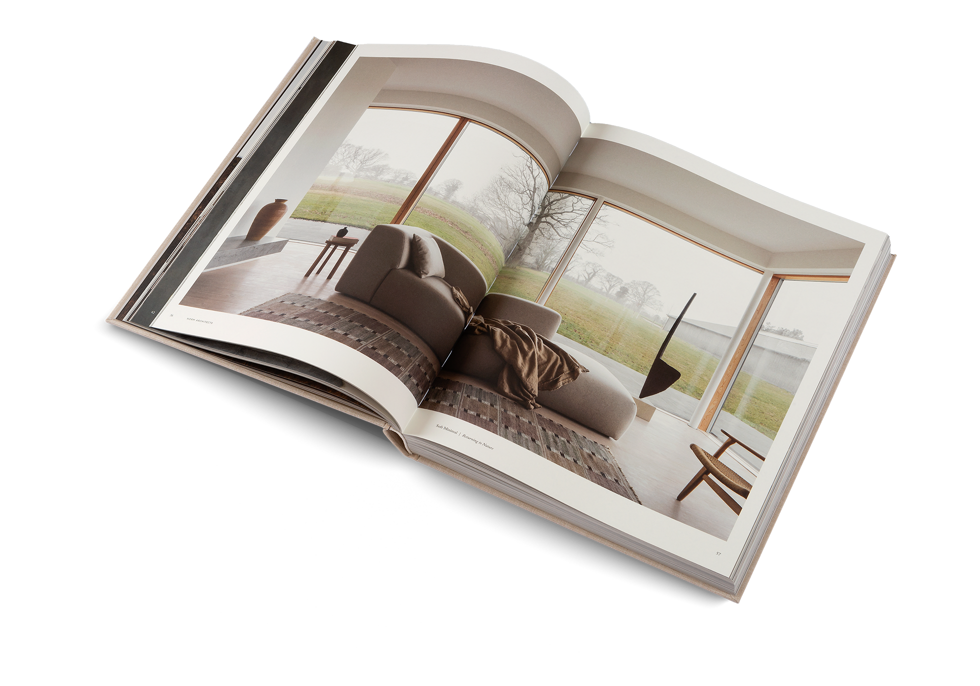 Open book showing a interior design layout with furniture.