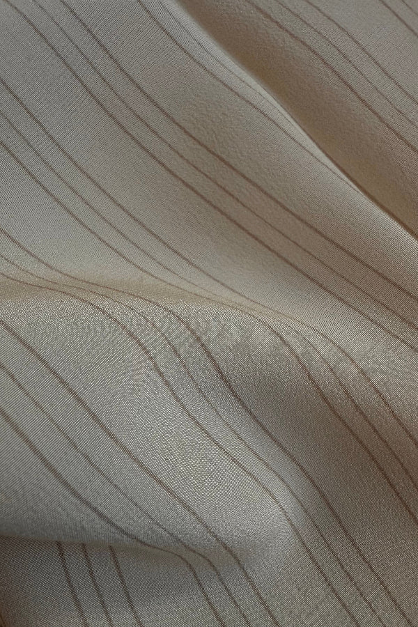 Close-up of beige fabric with subtle texture | Grid Hover | Exclude