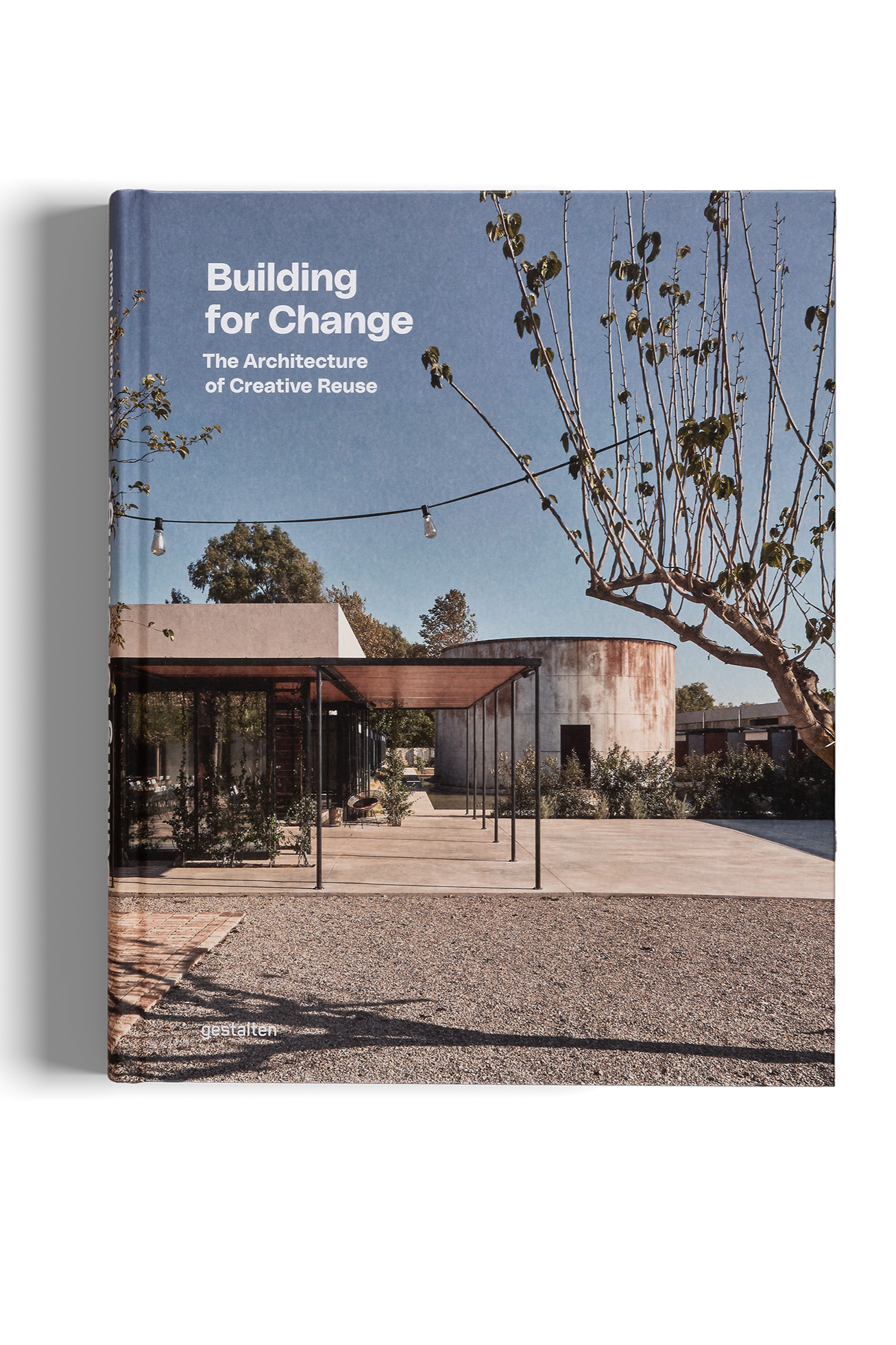 Book cover titled 'Building for Change: The Architecture of Creative Reuse' with a photograph of a building.