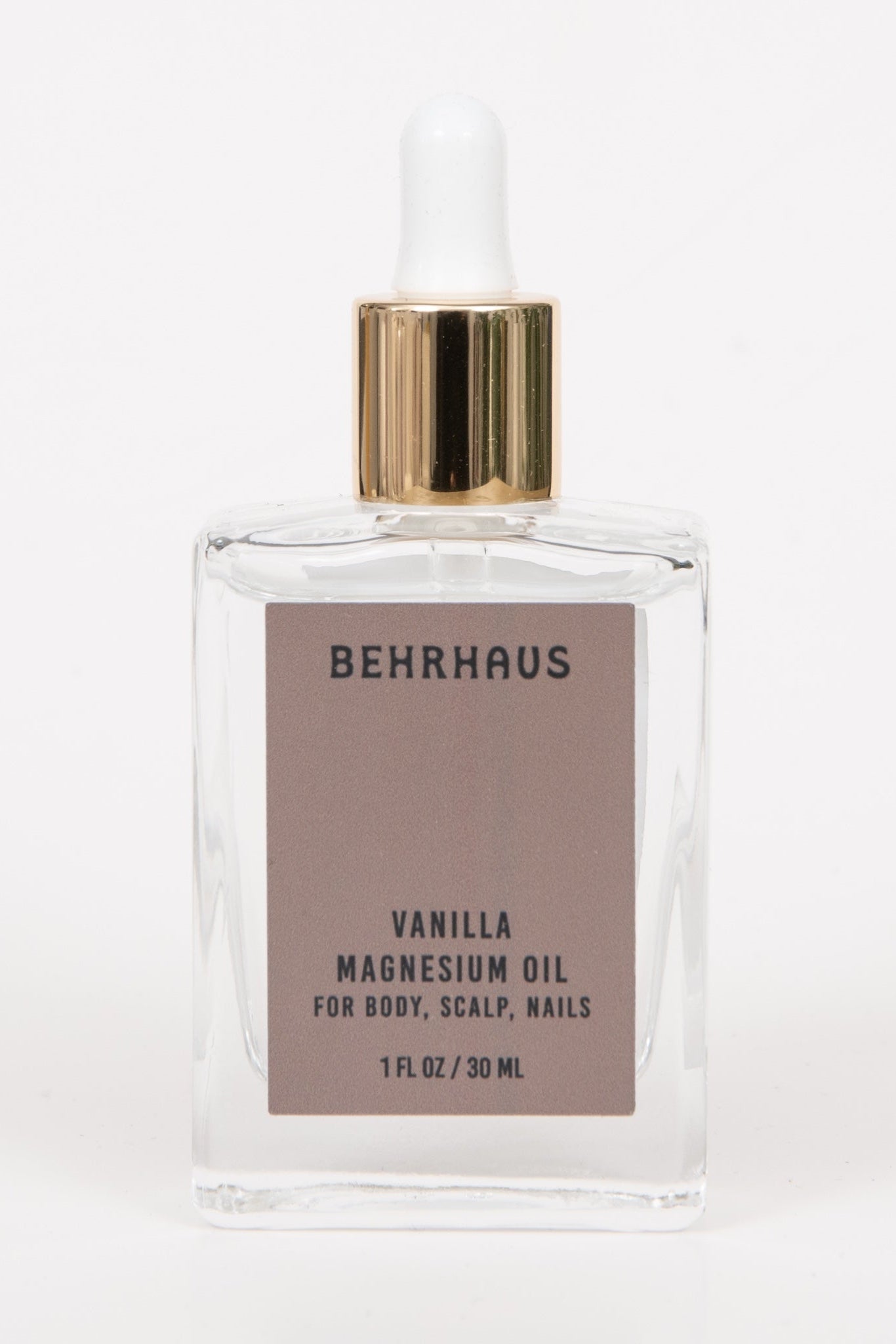 Bottle of Behrhaus Vanilla Magnesium Oil on a white background