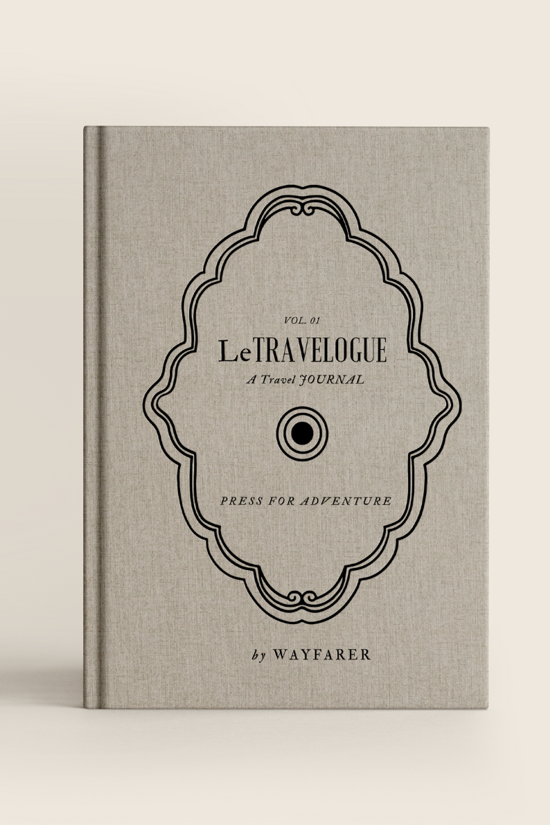 Gray journal with decorative cover and text on a beige background