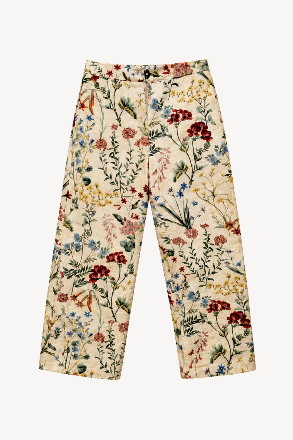 A pair of wide-leg cropped high-waisted pants featuring an all-over vintage floral and botanical print on a cream-colored base, displayed flat against a solid white background.