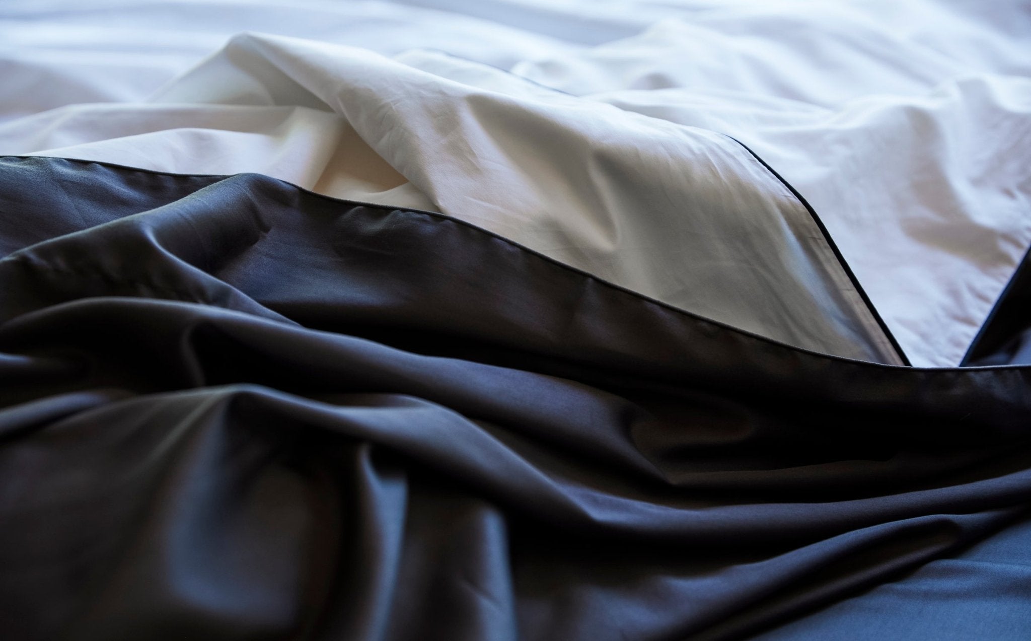 Close-up of black and white fabric with a blurred background