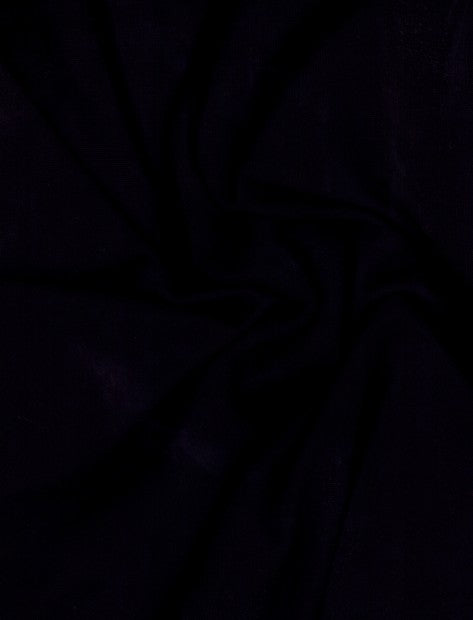 Dark image with a small visible object in the center