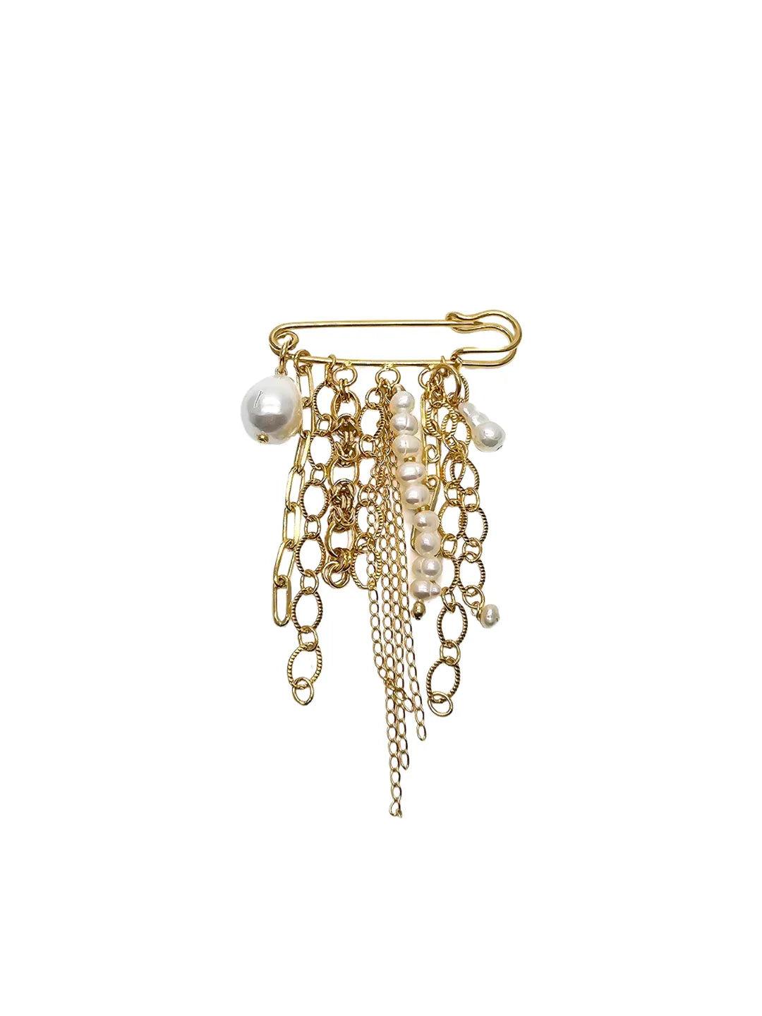 Gold brooch with chains and pearls on a white background