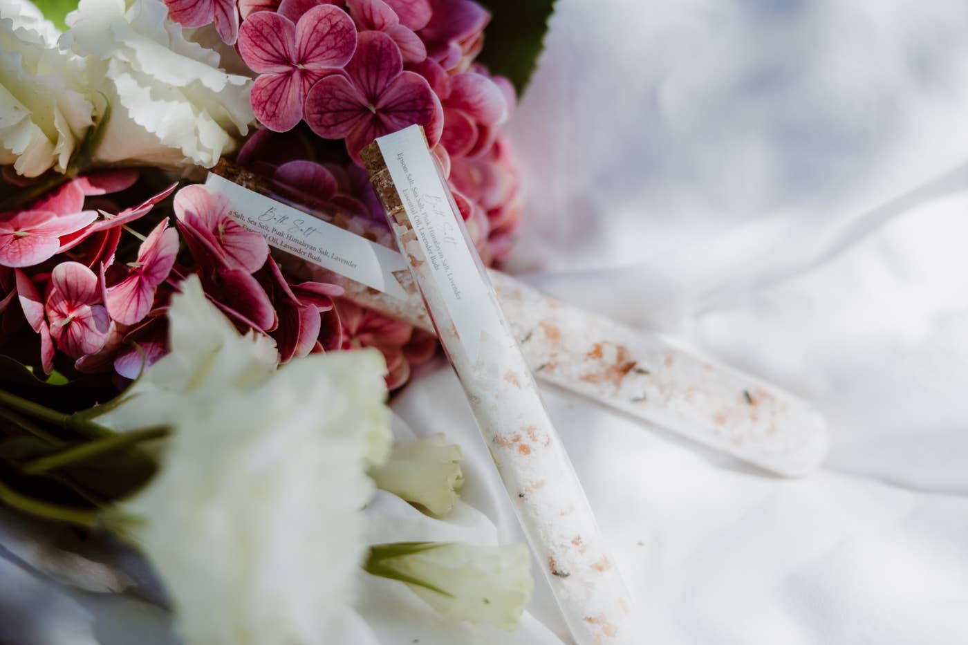 Close-up of a bouquet with pink and white flowers on a blurred background