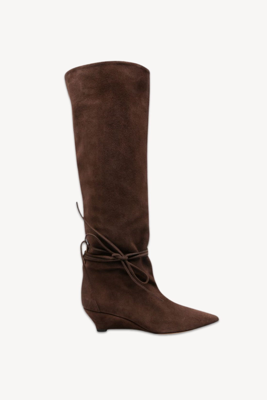 A single knee-high brown suede boot with a pointed toe and a wrap-around lace detail at the ankle, shown against a plain off-white background.