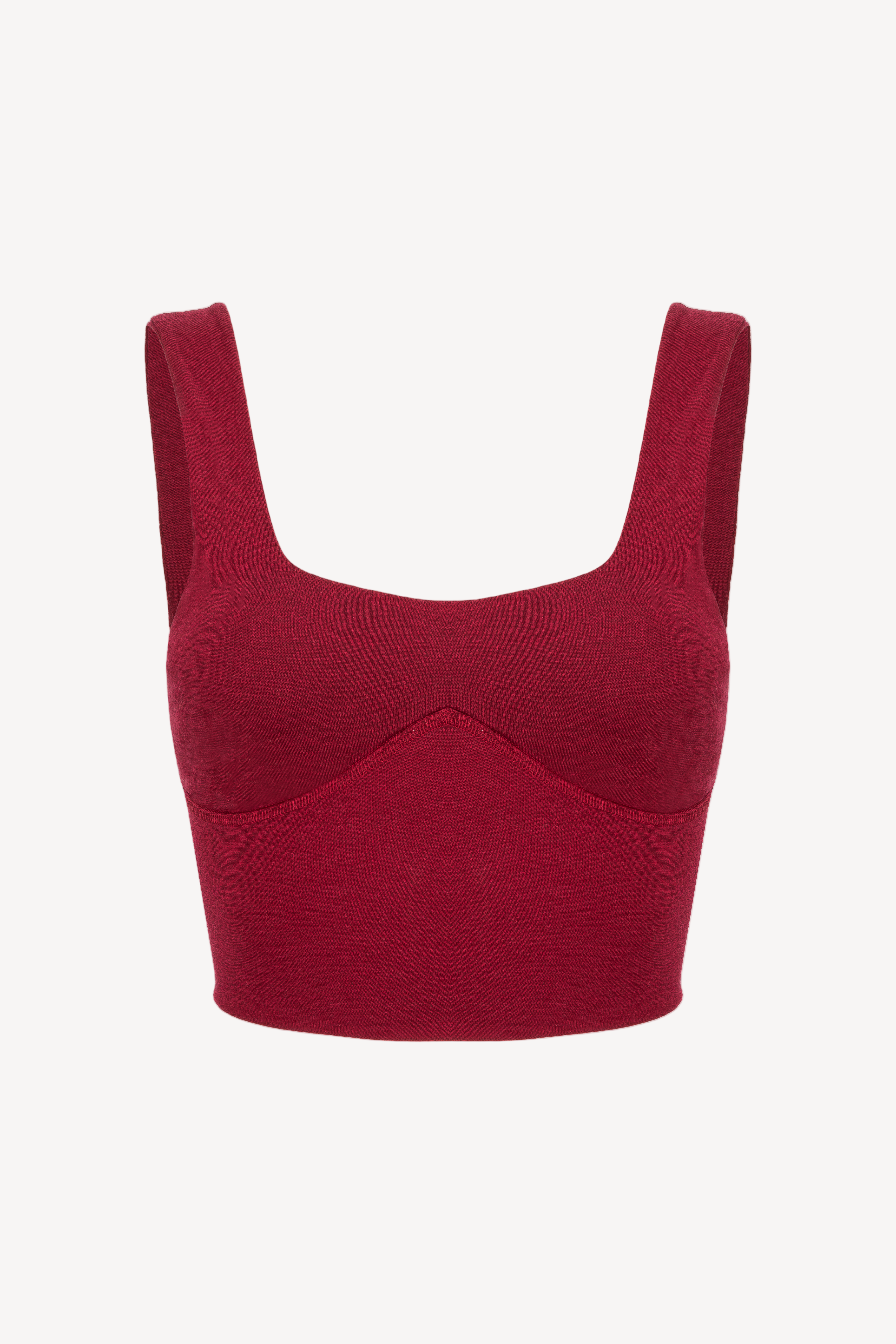 Red crop top on a light beige background