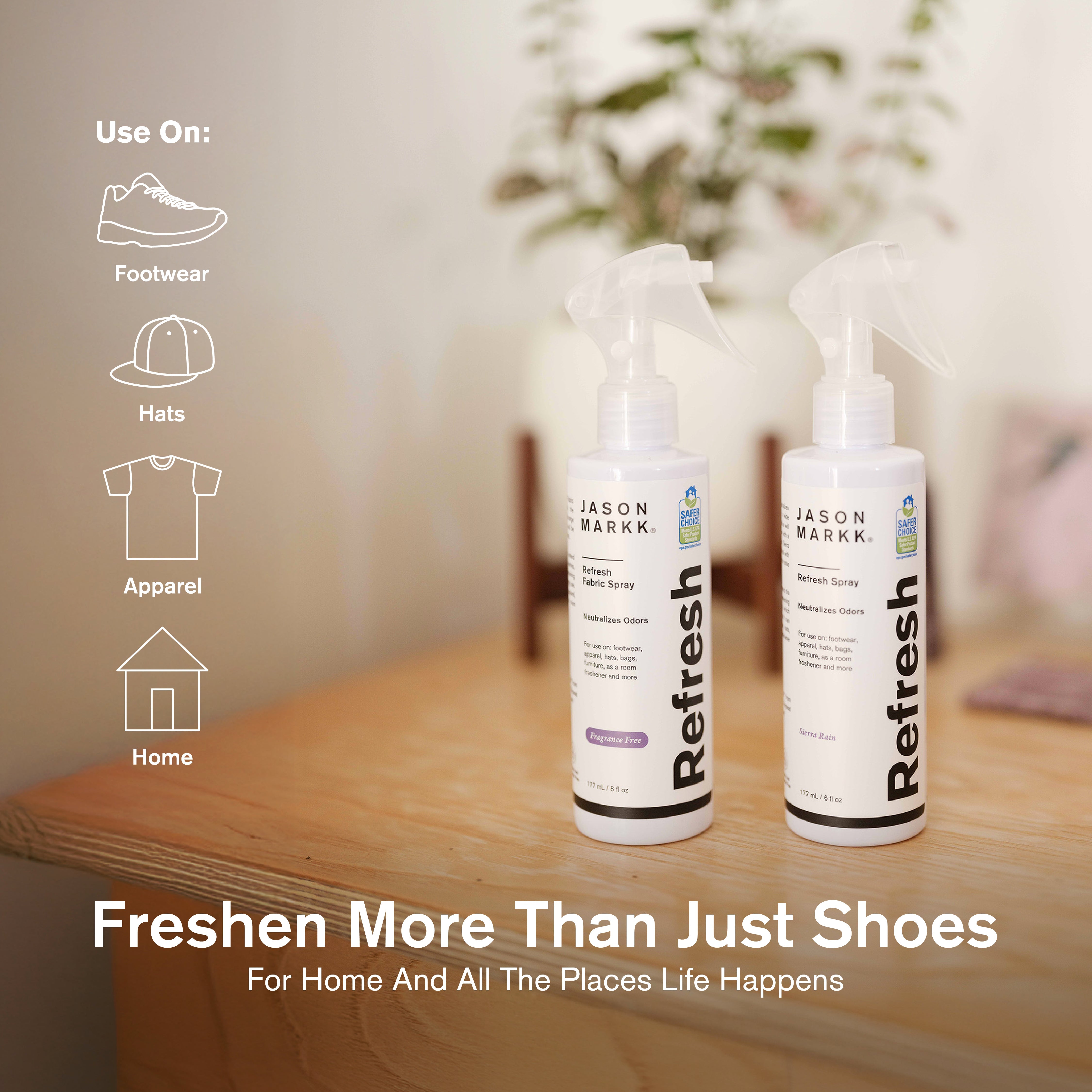 Two bottles of Jason Markk Refresh spray on a wooden surface with product usage icons and text.