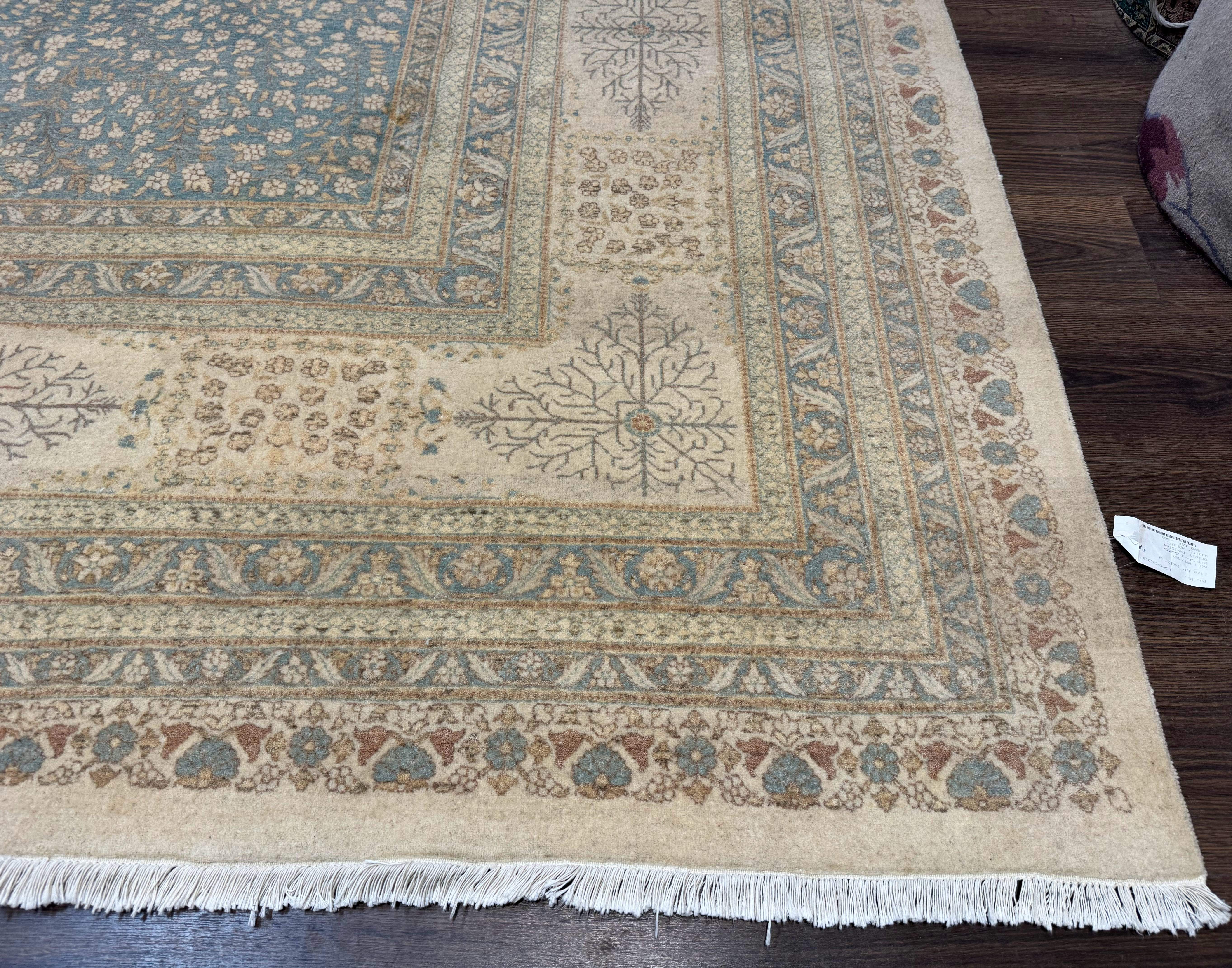 Close-up of a patterned rug on a wooden floor
