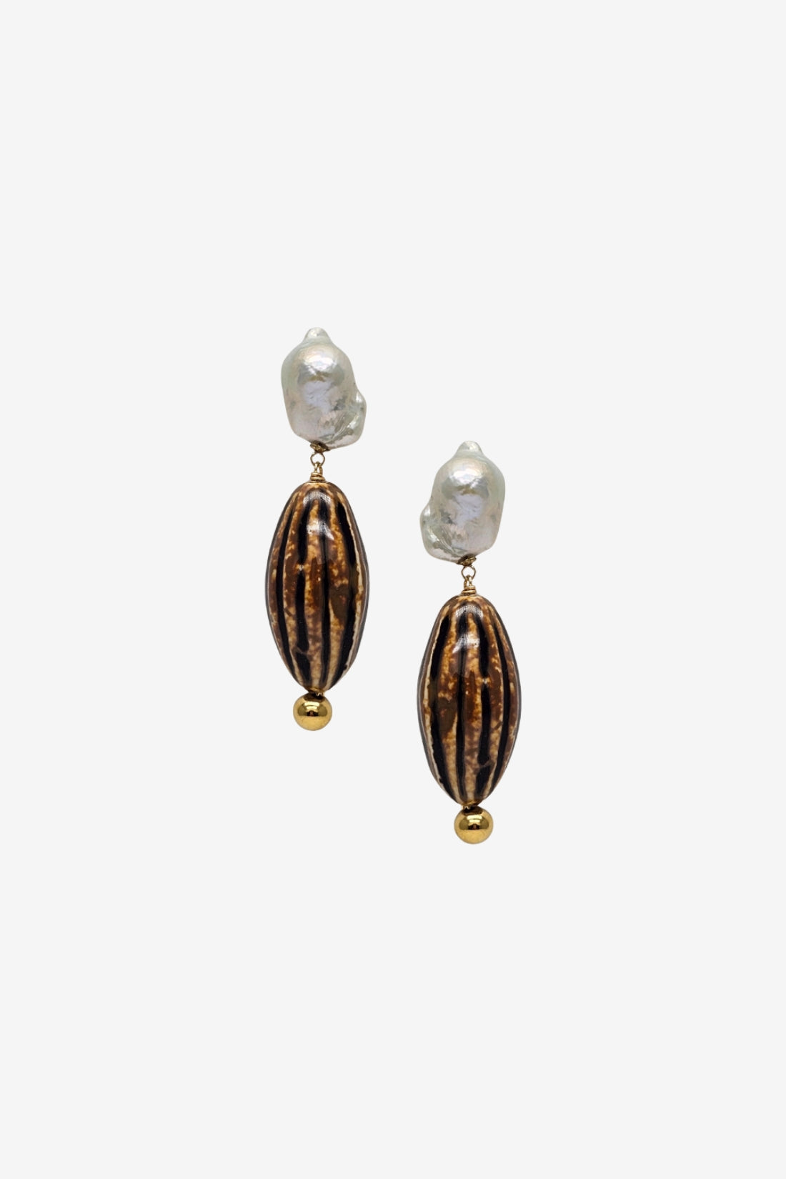 Pair of earrings with striped brown and gold beads on a white background
