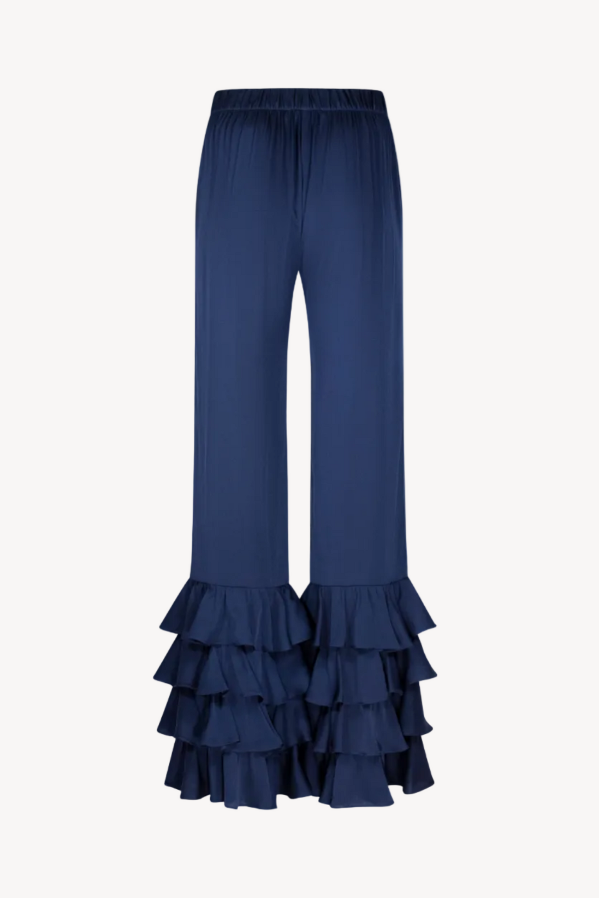 Navy blue ruffled silk pants on a light gray background
