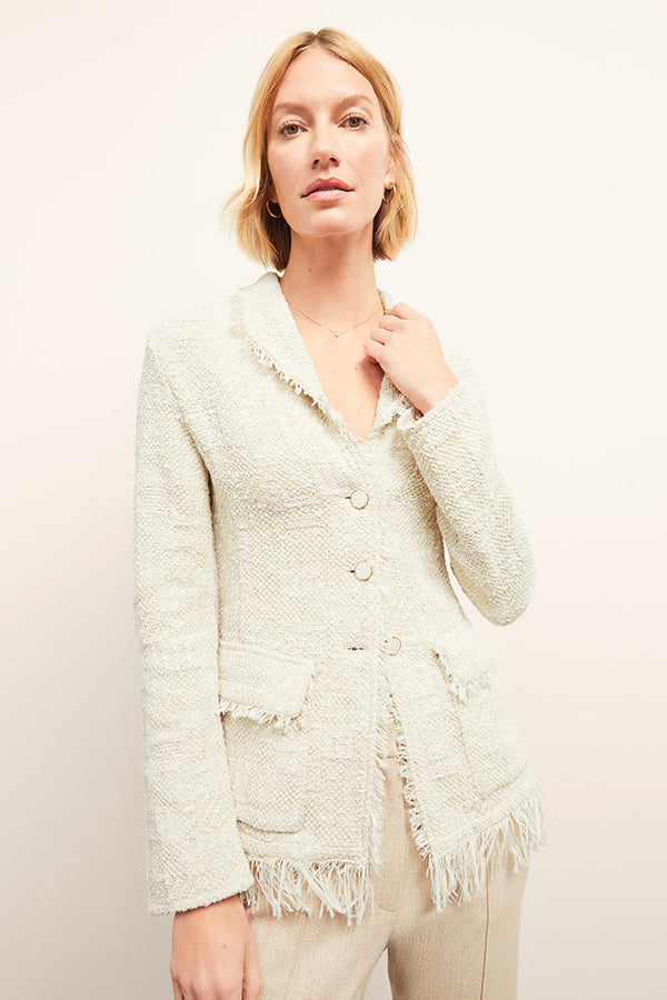 Front image of a woman standing wearing the porter jacket in taupe and ivory | Exclude | Grid
