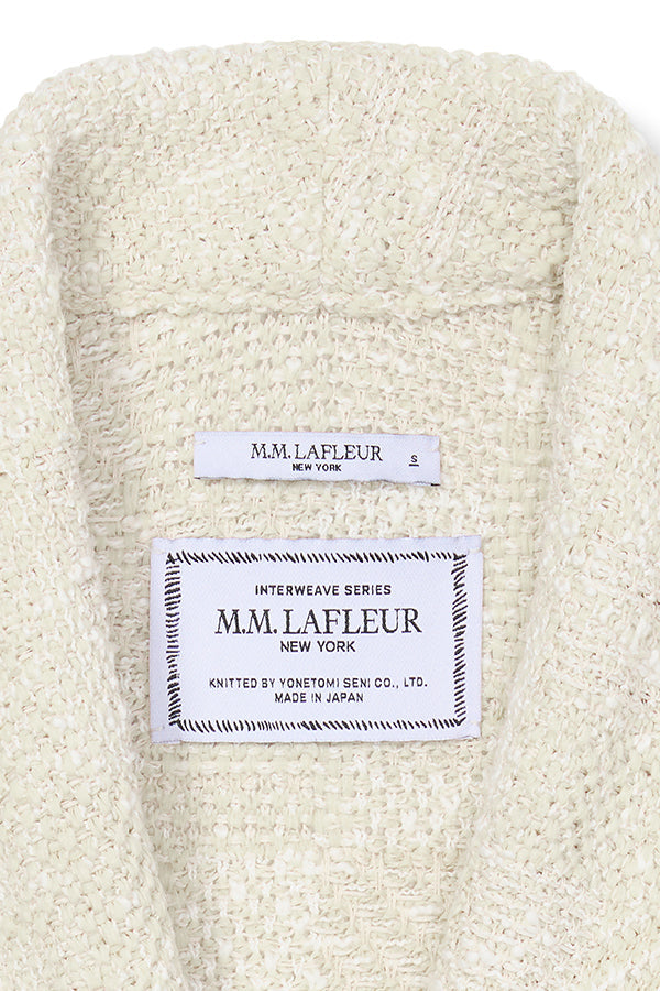close up image of the tag of the porter jacket in taupe and ivory | Exclude