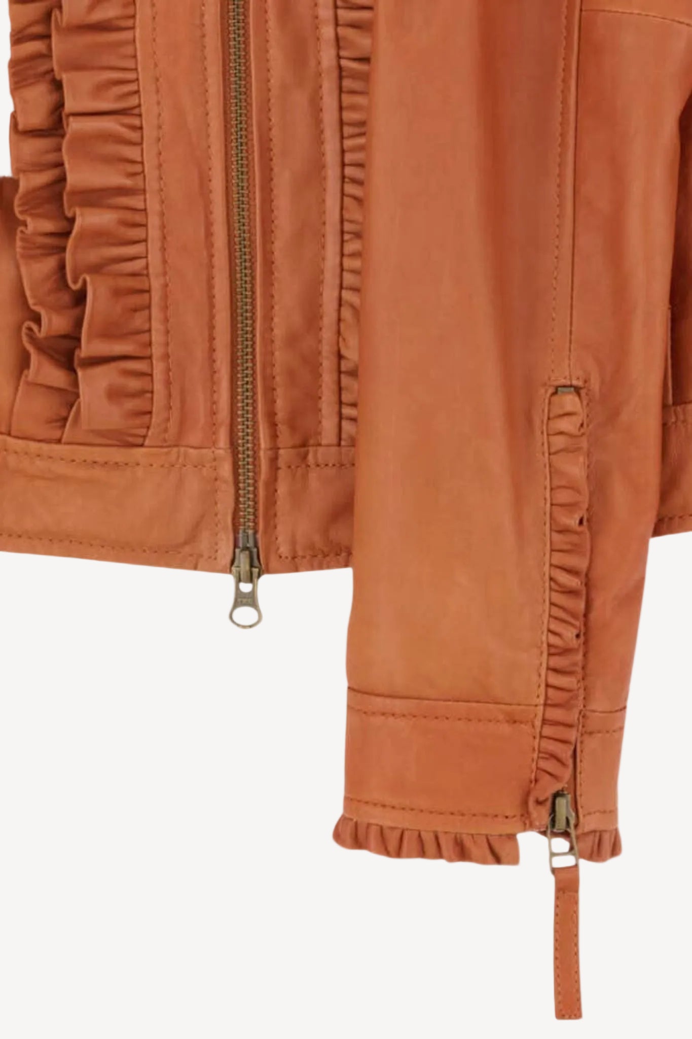 Close-up of a brown jacket with ruffled details on a white background