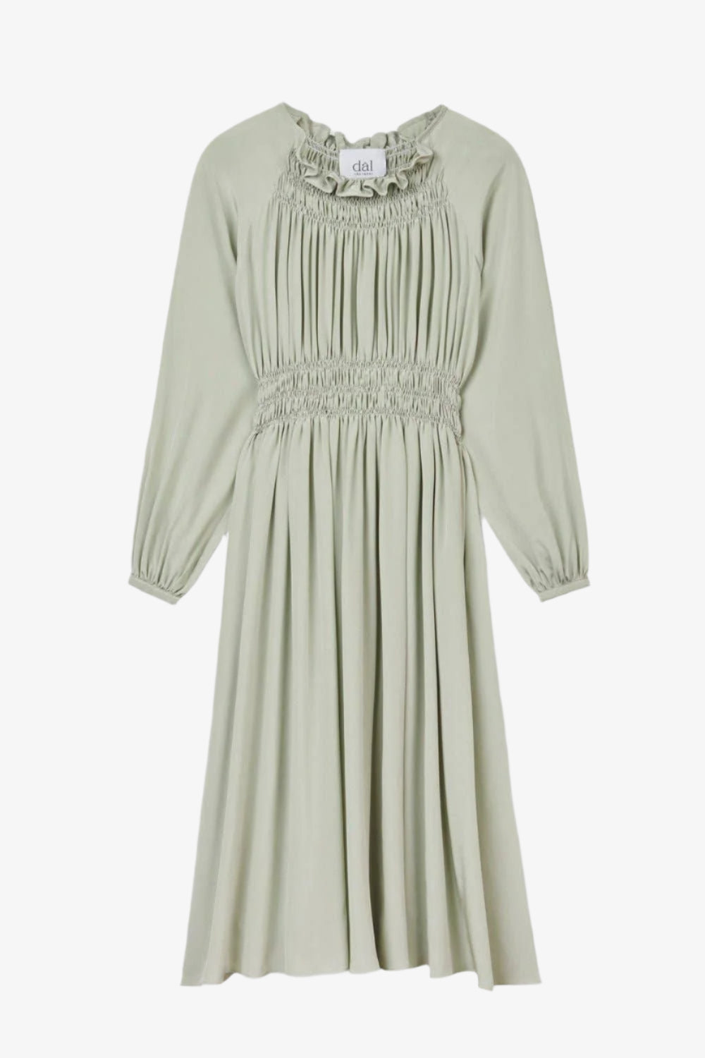 Green dress with smocked details on a white background