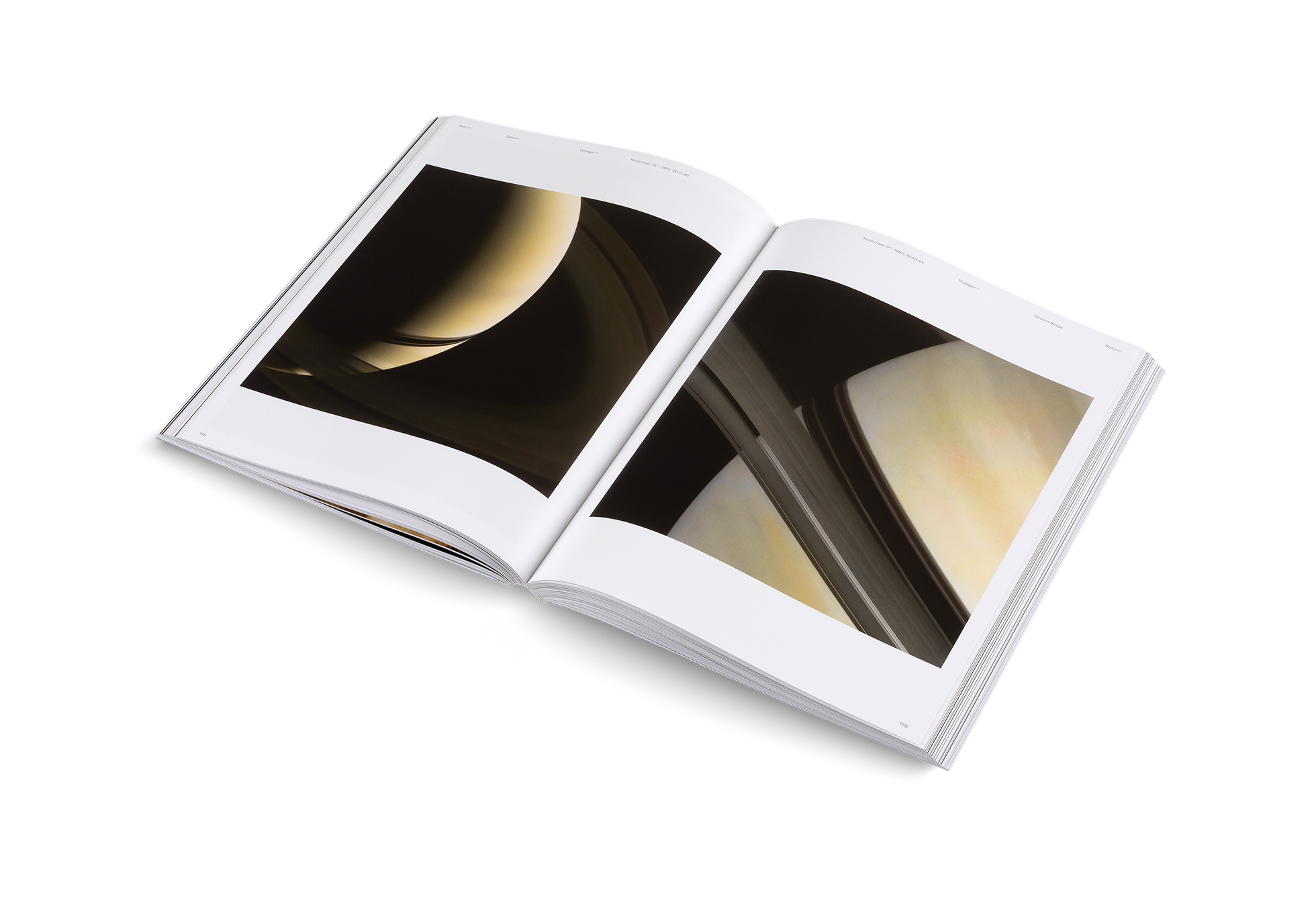 Open book displaying a photograph of a celestial body on a white background