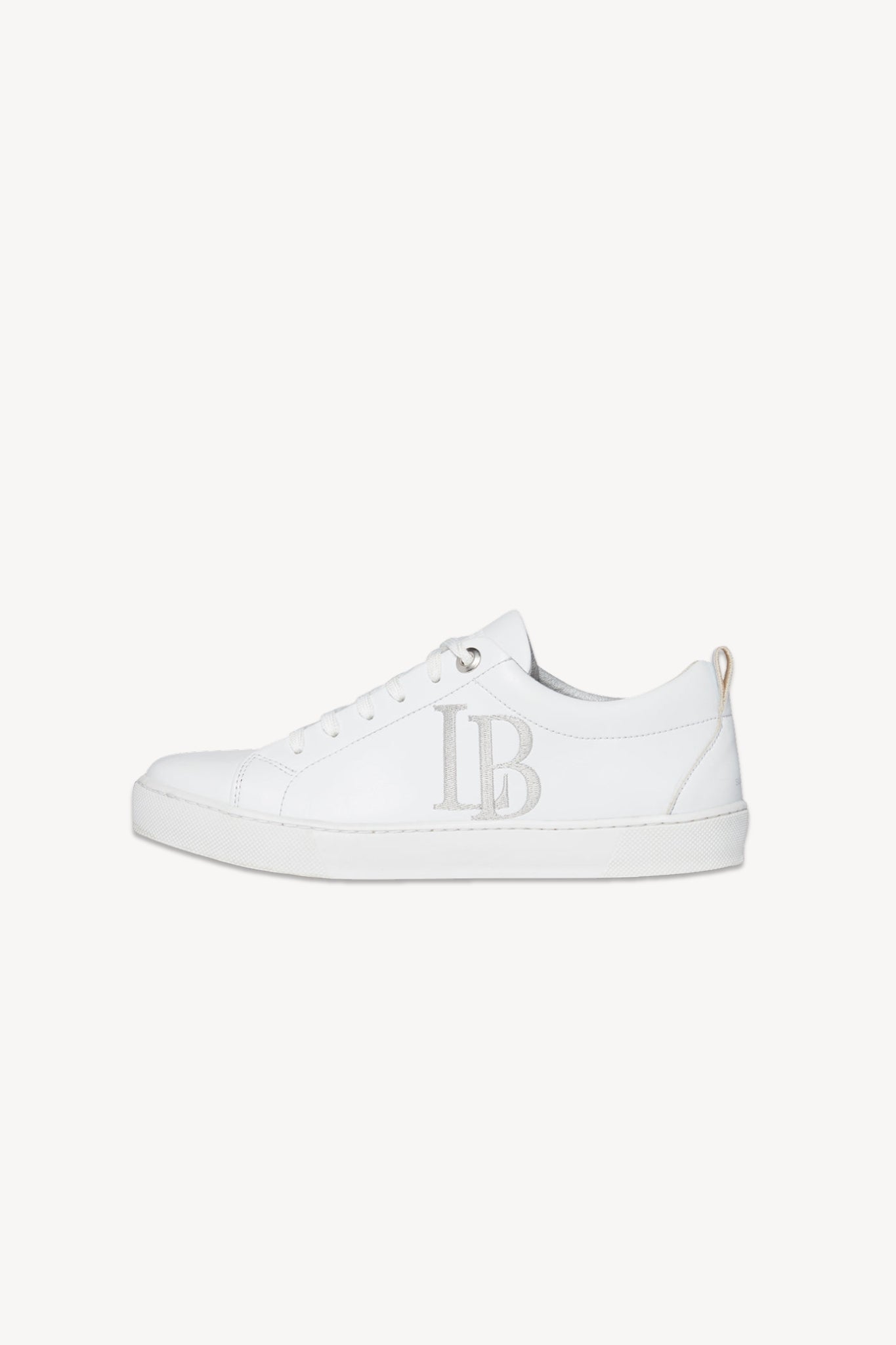 White sneaker with a logo on a white background