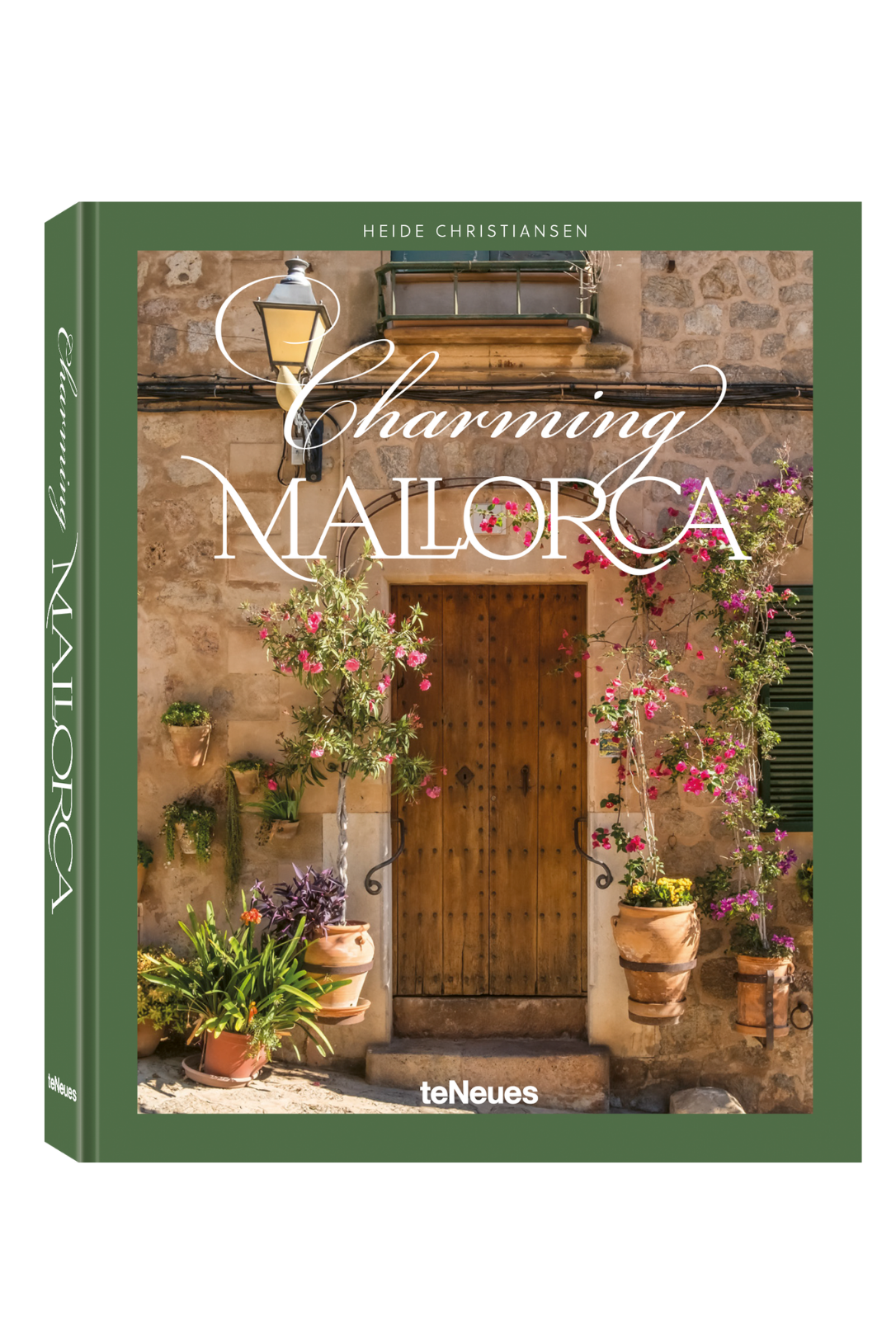 Book cover of 'Charming Mallorca' with a scenic door and plants on a white background