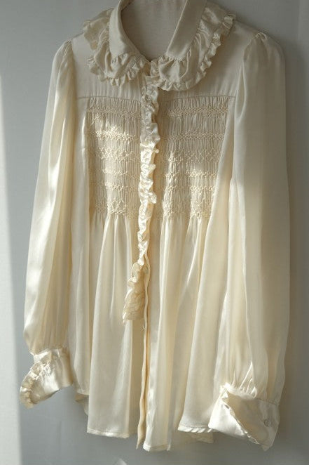 Ivory satin silk button up blouse.