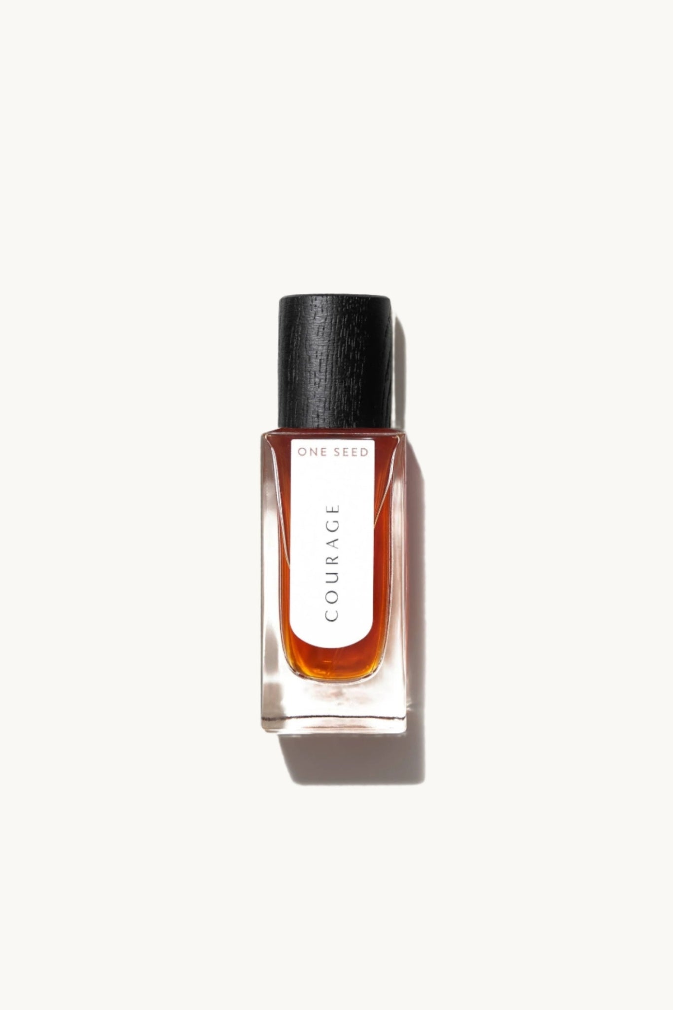 Perfume bottle from One Seed labeled 'Courage' on a white background