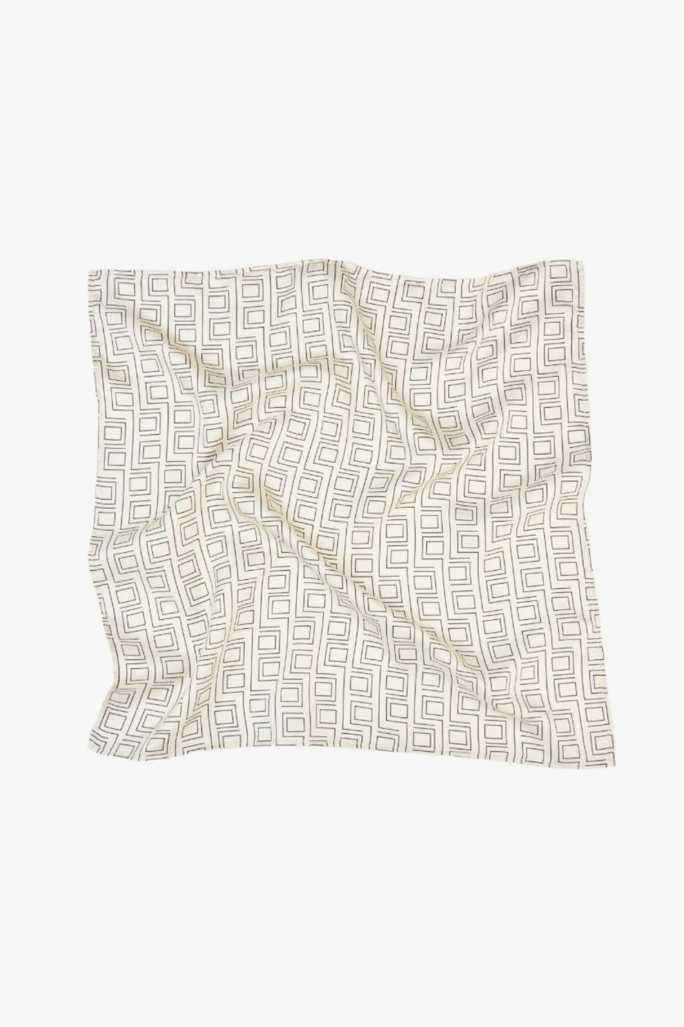 Patterned square silk scarf on a white background