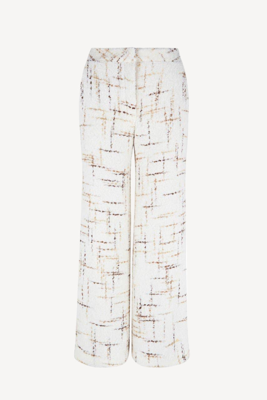 Tweed pants with colored dash design floating in white space.