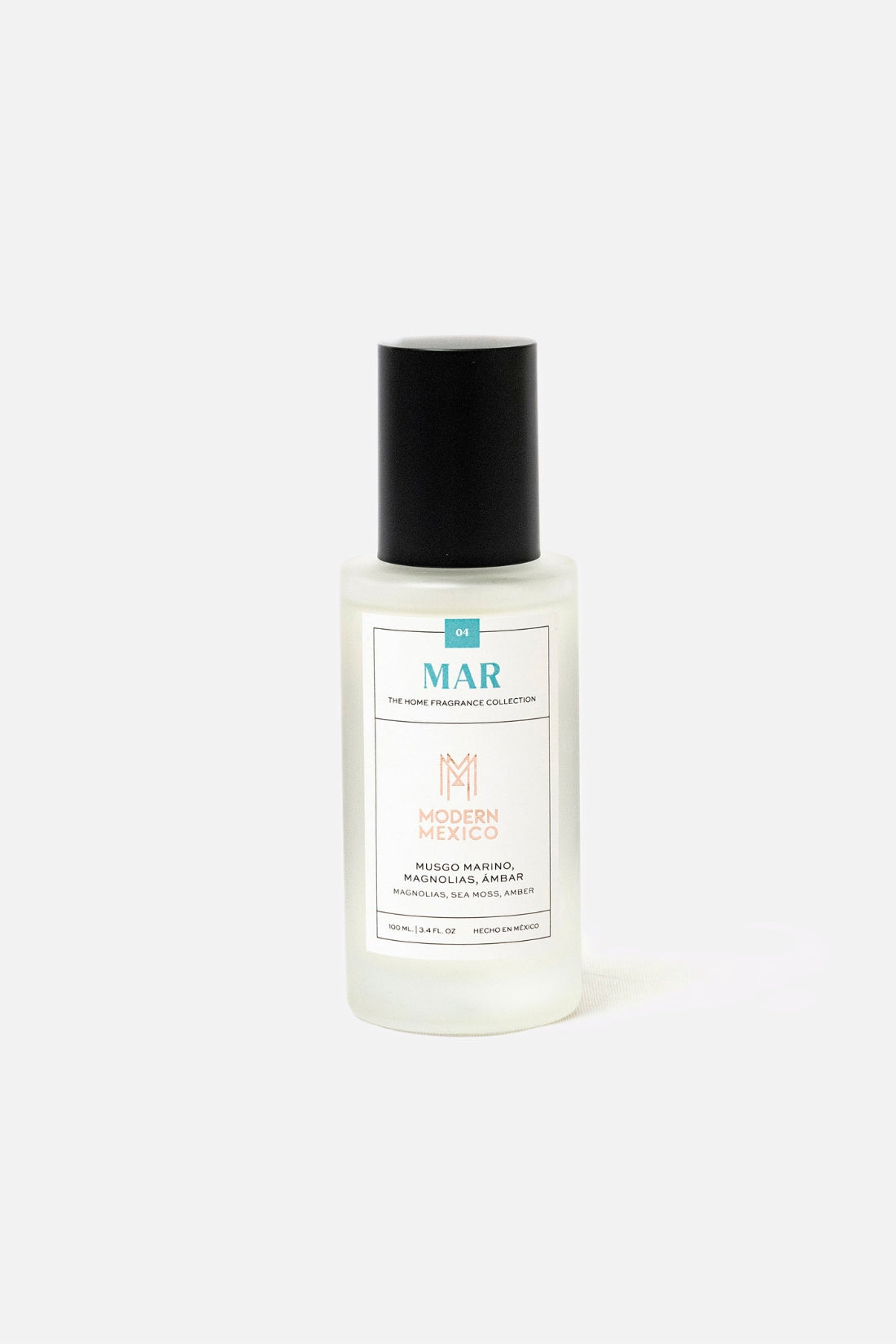 White ocean scented home fragrance bottle by Modern Mexico that reads "MAR" with black cap on a white background