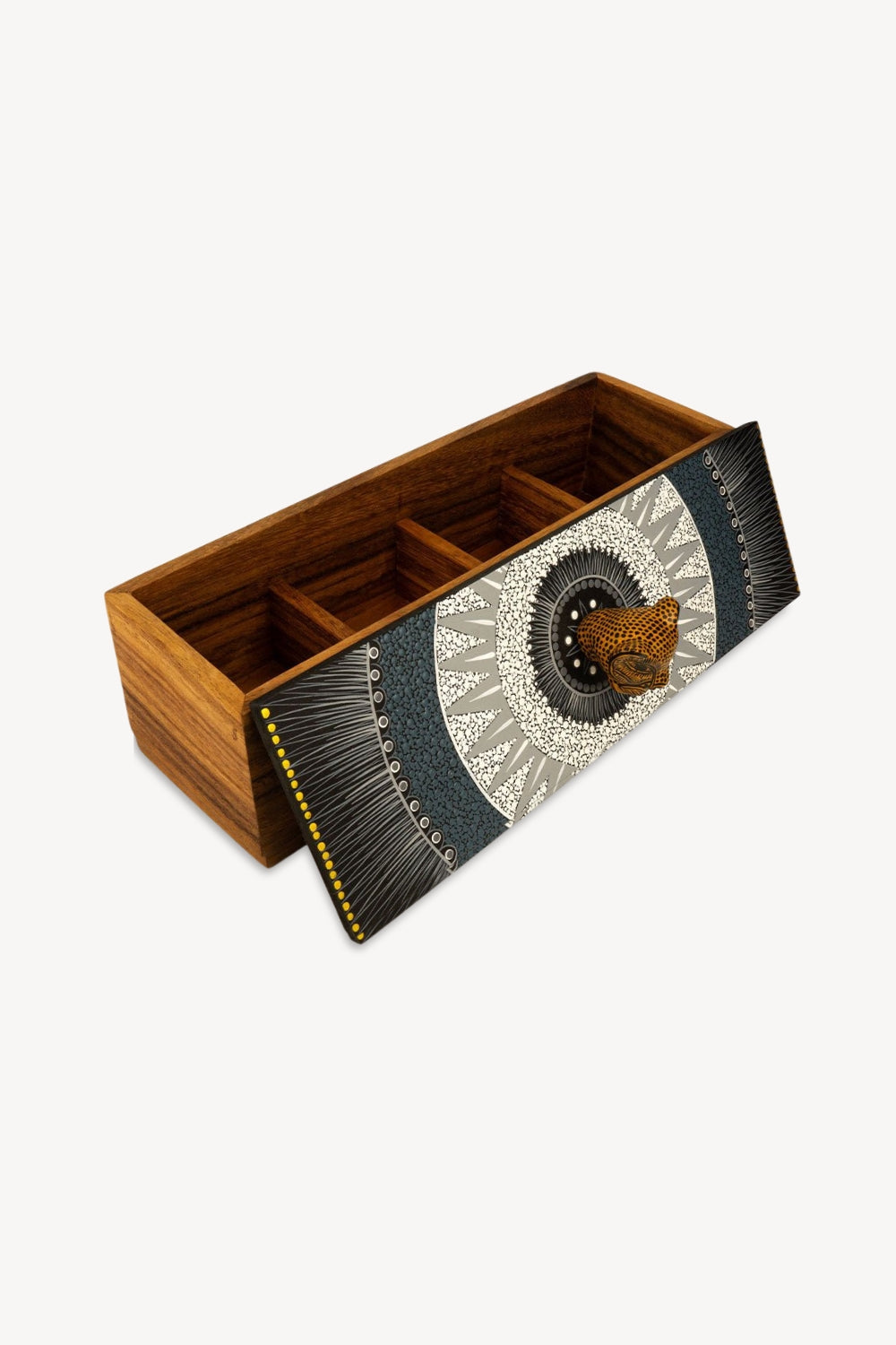 A rectangular wooden organizer box with a sliding front panel, shown open on a white background. The interior has multiple compartments, and the front panel features a decorative black, white, and gray geometric pattern with a small brown woven accent.