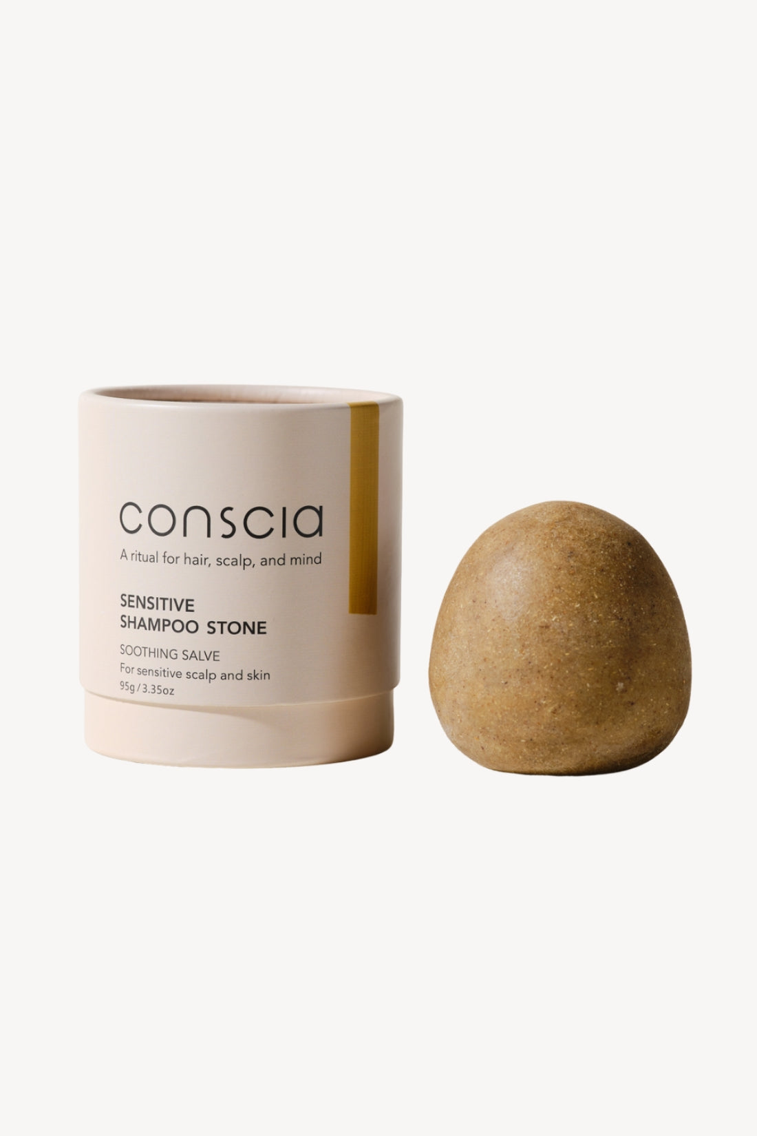 Conscia sensitive shampoo stone with packaging on a white background