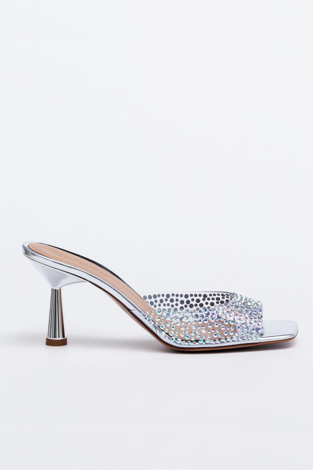 Silver high-heeled shoe with crystal embellishments on a white background