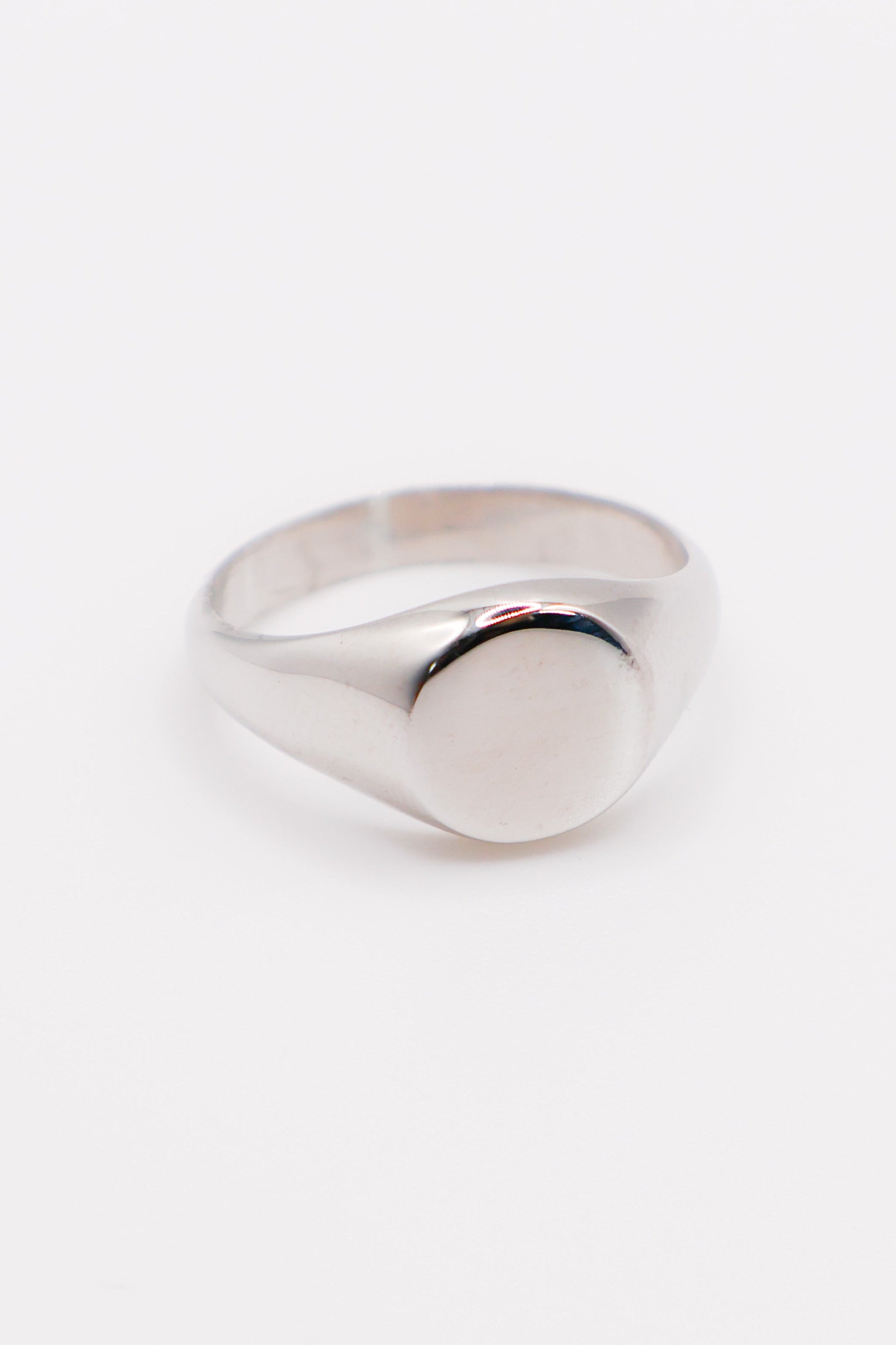 Silver ring on a white background